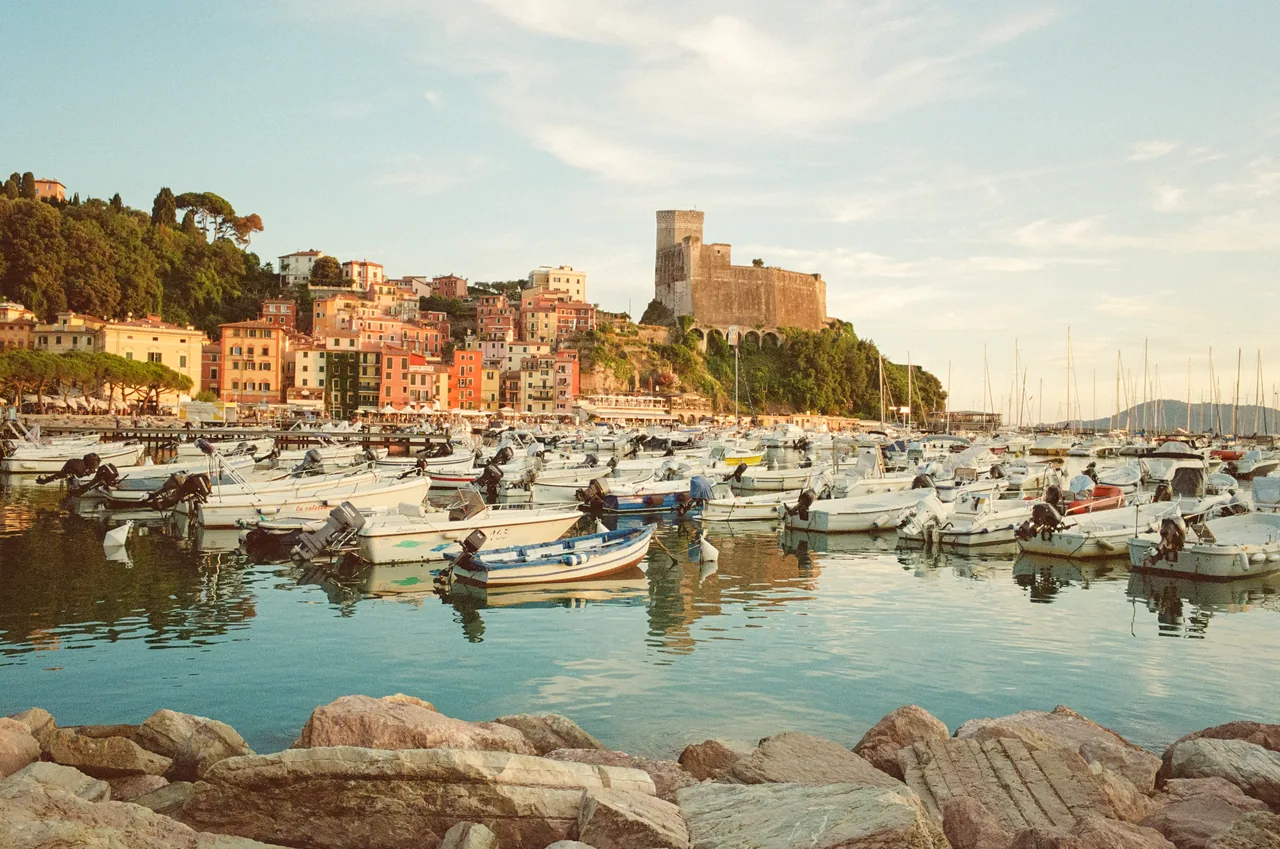 A castle above a harbour on the Ligurian coast, shot on film