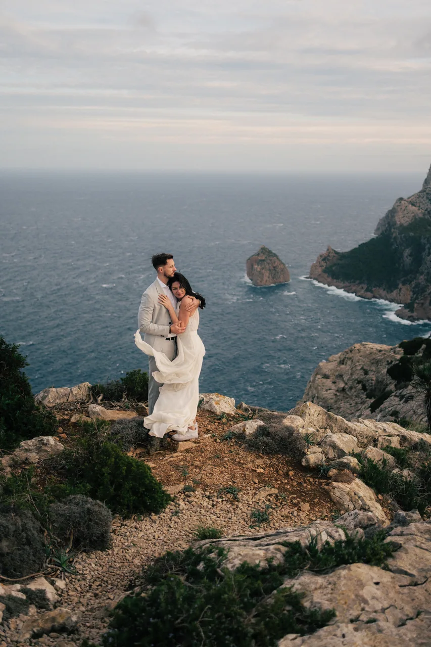 A couple on a Mallorcan clifftop