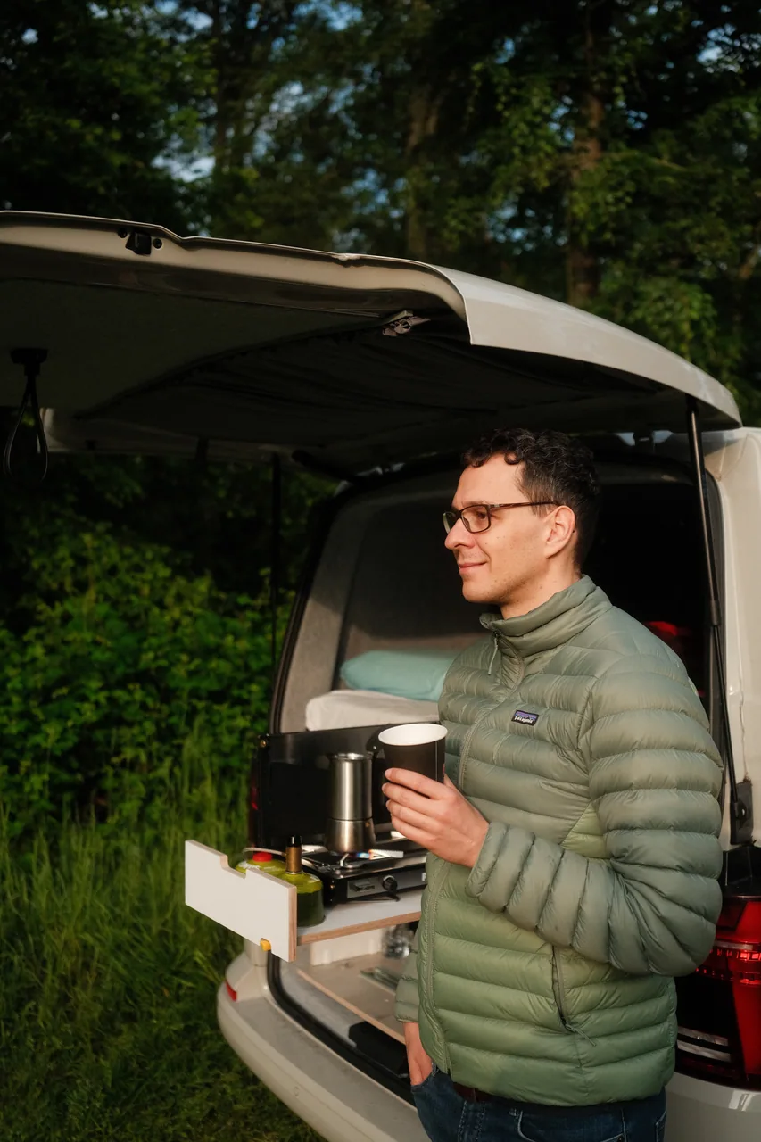 Rainer with a camera at the back of his camper van